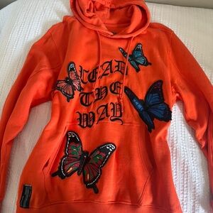Bold Orange Hoodie with Butterfly Accents